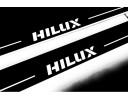 Накладки порогів зі статичним підсвічуванням для Toyota Hilux VIII з 2015